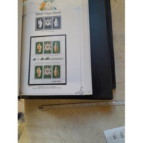 120 - Stamps :  25th Anniversary of the Coronation Commemorative stamp albums, 2 x sparsely filled albums ... 