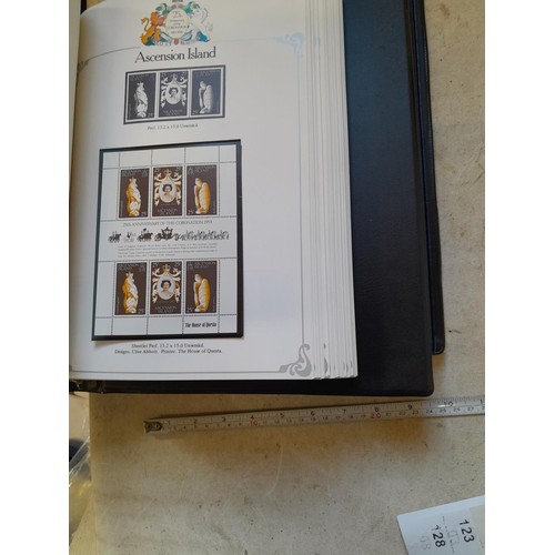 120 - Stamps :  25th Anniversary of the Coronation Commemorative stamp albums, 2 x sparsely filled albums ... 