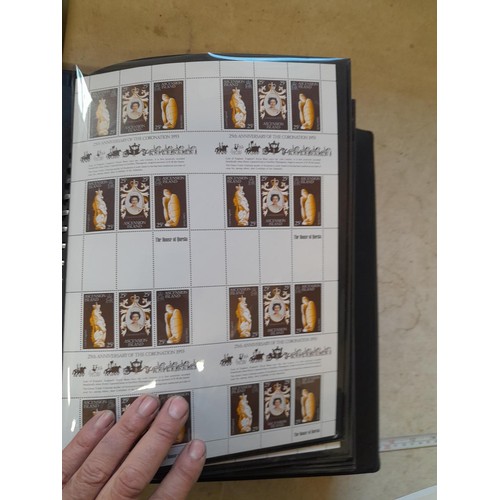 120 - Stamps :  25th Anniversary of the Coronation Commemorative stamp albums, 2 x sparsely filled albums ... 