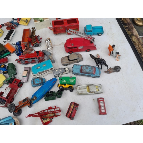 156 - Nice array of vintage die cast toy cars : Dinky, Corgi, Spot On and others all in play worn conditio... 