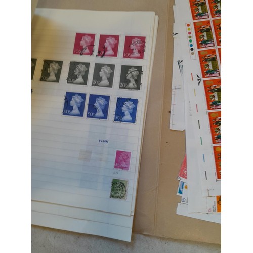 175 - Stamps : Folder of unmounted mint GB Commemorative stamps as part sheets and blocks, from 1960s and ... 