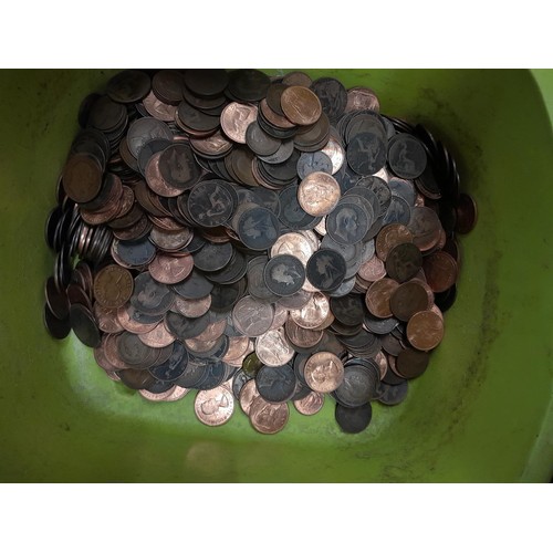 215 - In excess of 21 kg of assorted base metal UK coins, usually lower denomination to brass threepences,... 