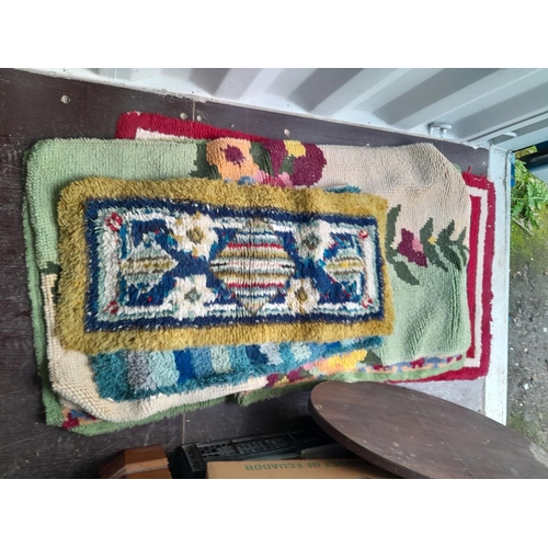 243 - Textiles : Collection of hand made vintage wool rugs of various sizes