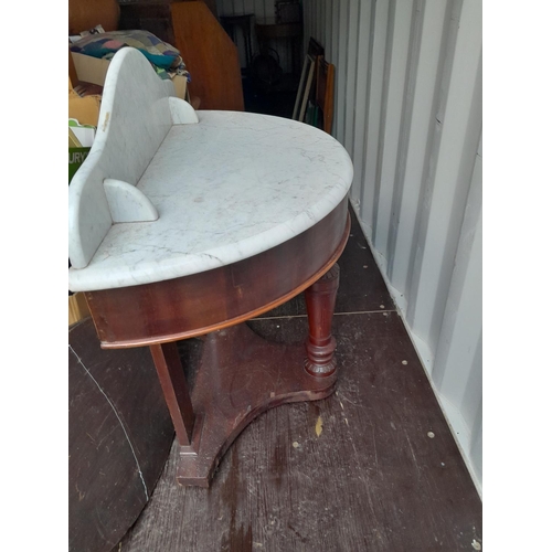 249 - Edwardian mahogany demi lune marble top wash stand