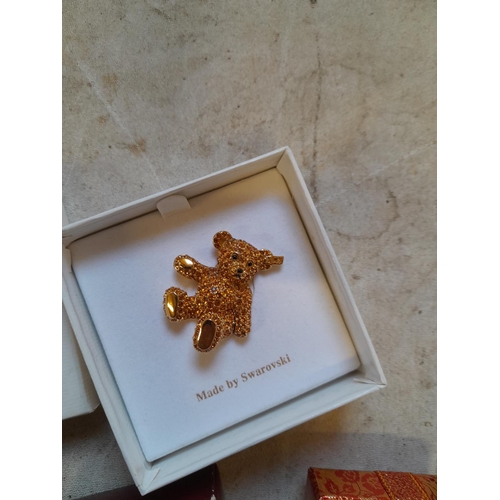 260 - Collection of Steiff jewellery : gold plated articulated bear pendant, , brooch etc.