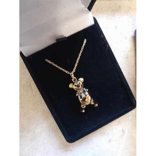 260 - Collection of Steiff jewellery : gold plated articulated bear pendant, , brooch etc.