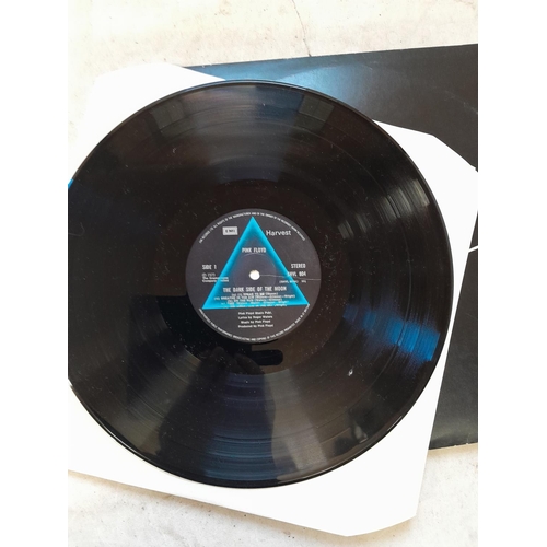 276 - 2 x vinyl record album : Pink Floyd Dark Side with 2 x stickers & 2 x posters, good condition, needs... 