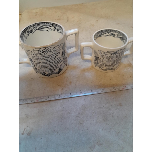 298 - 2 x 19th century pottery two handle loving / cider mugs with transfer printed decoration :