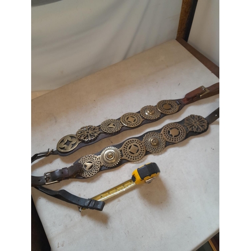 633 - Late 19th and early 20th century interesting horse brasses mounted on repaired straps from  the 1930... 