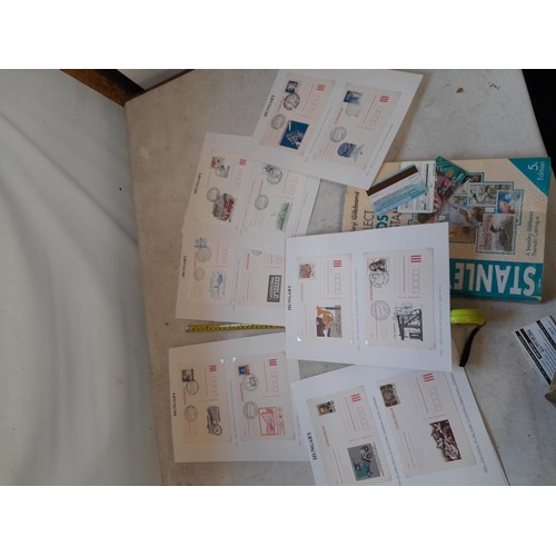 59 - Random array of stamps, some mint and used in sheets, stock book, First Day Covers, phonecards