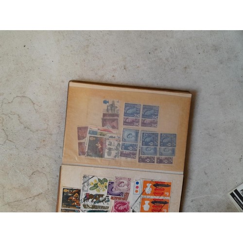 59 - Random array of stamps, some mint and used in sheets, stock book, First Day Covers, phonecards