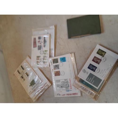 59 - Random array of stamps, some mint and used in sheets, stock book, First Day Covers, phonecards