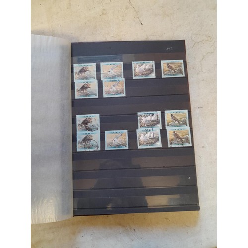 64 - Stamps 6 x sparsely filled mint and used stamps of the world mounted loosely on sheets in stock book... 