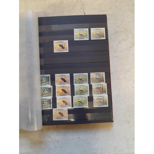 64 - Stamps 6 x sparsely filled mint and used stamps of the world mounted loosely on sheets in stock book... 