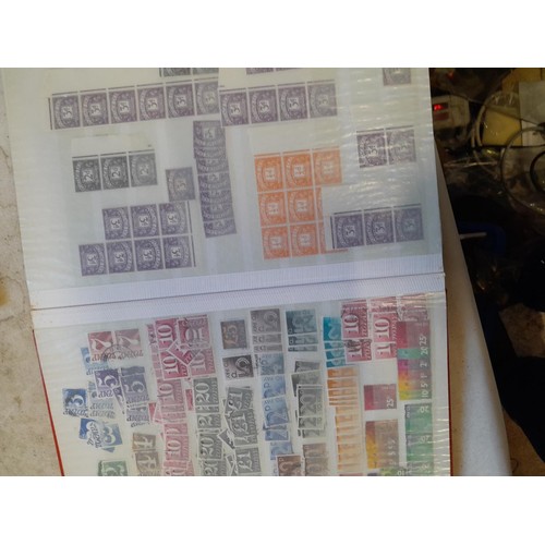 64 - Stamps 6 x sparsely filled mint and used stamps of the world mounted loosely on sheets in stock book... 