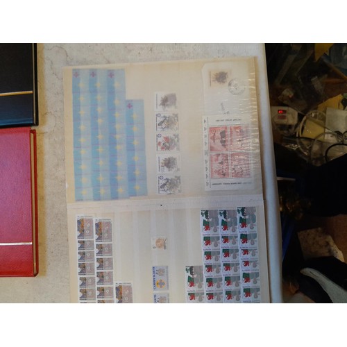 64 - Stamps 6 x sparsely filled mint and used stamps of the world mounted loosely on sheets in stock book... 