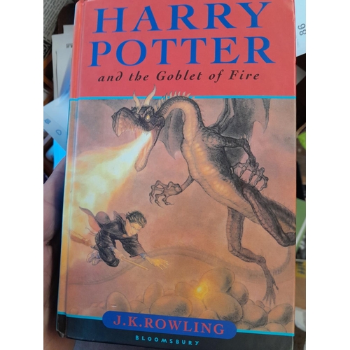 76 - Childrens books : Harry Potter, three volumes and others