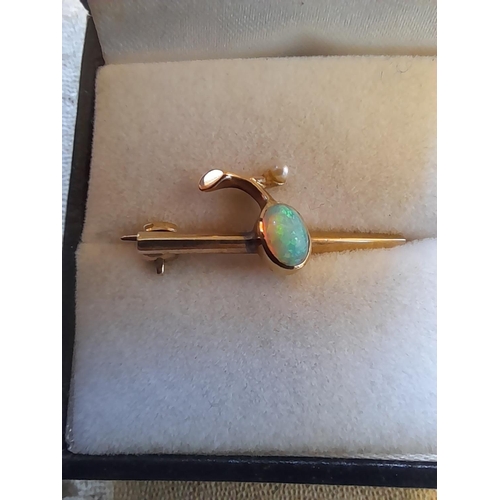 120 - Pretty unmarked but tested 9 ct gold pin brooch set with opal and seed pearl 2.1 g