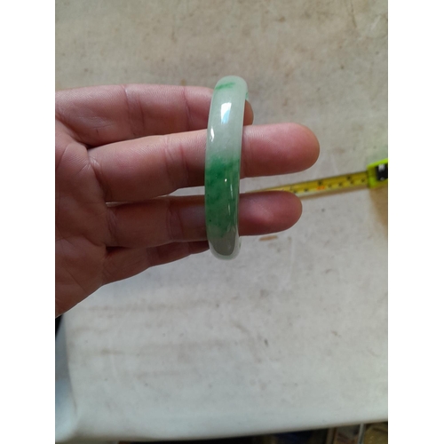 125 - Carved Chinese jade bangle