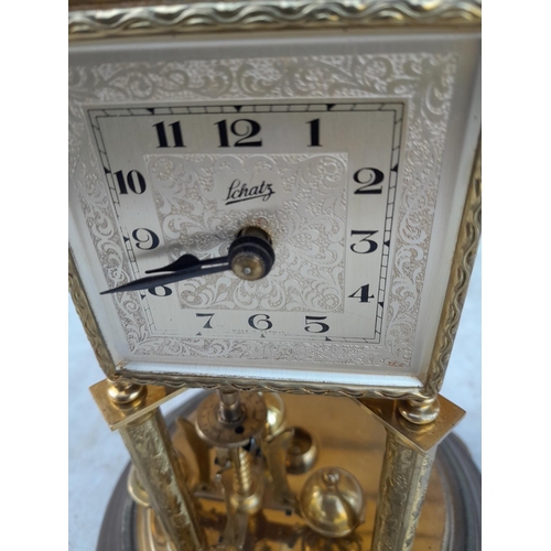 195 - Vintage anniversary clock in glass dome