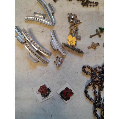 279 - Costume jewellery, badges, rosaries, very small amount of silver included