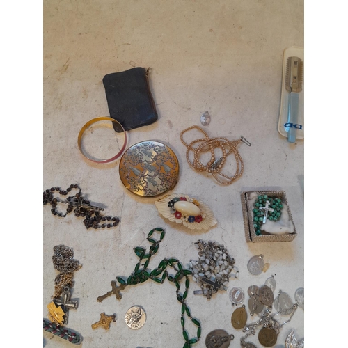 279 - Costume jewellery, badges, rosaries, very small amount of silver included