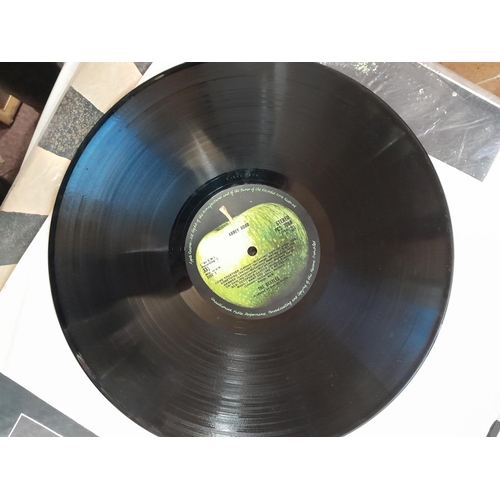 294 - 2 x vinyl record albums : Beatles Let it Be & Abbey Road, both playable but need a clean