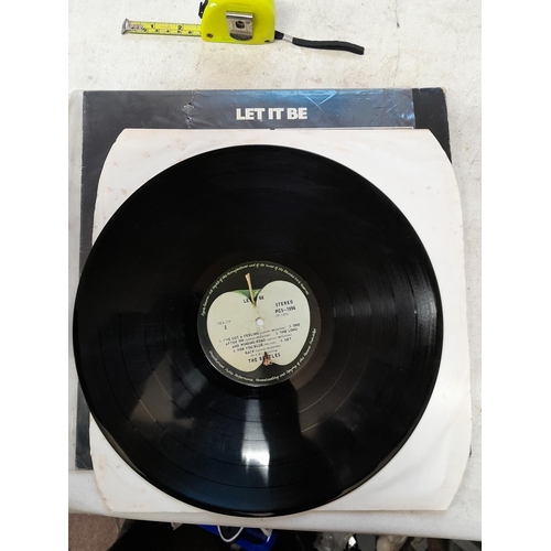 294 - 2 x vinyl record albums : Beatles Let it Be & Abbey Road, both playable but need a clean