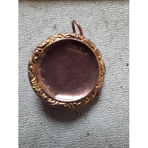 18 - Vintage gold front and back photograph locket set with rubies, some stone missing