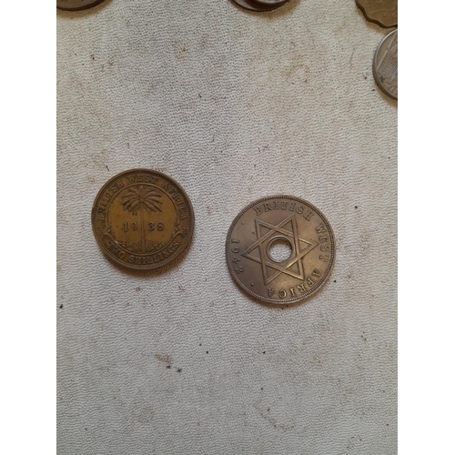 32 - Coins : tin of coins of the world  1939 British West Africa Three Pence