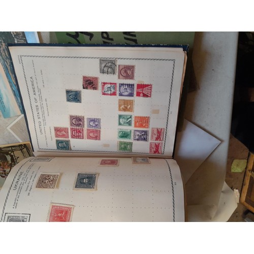 33 - Stamps and postcards : well filled world stamp album dating from 19th - late 20th century with colou... 