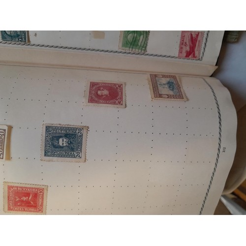 33 - Stamps and postcards : well filled world stamp album dating from 19th - late 20th century with colou... 