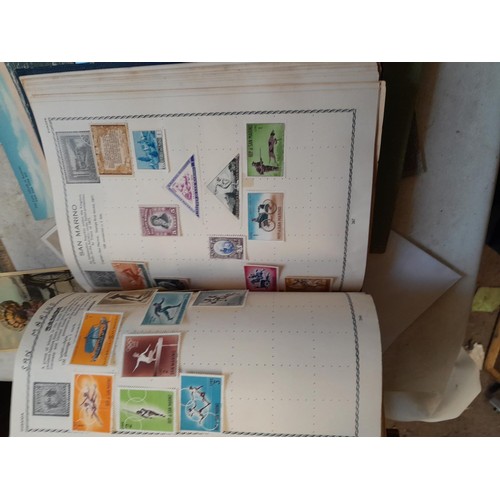 33 - Stamps and postcards : well filled world stamp album dating from 19th - late 20th century with colou... 