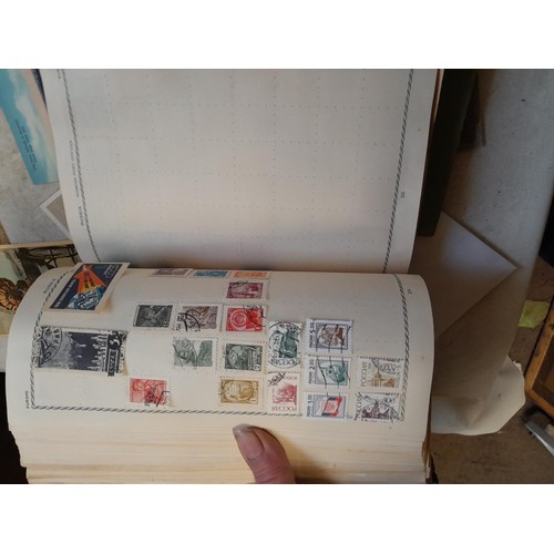 33 - Stamps and postcards : well filled world stamp album dating from 19th - late 20th century with colou... 