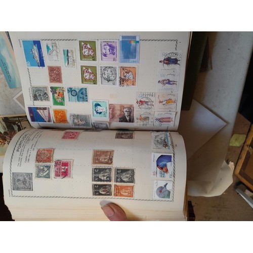 33 - Stamps and postcards : well filled world stamp album dating from 19th - late 20th century with colou... 