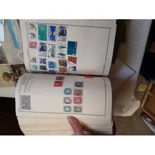 33 - Stamps and postcards : well filled world stamp album dating from 19th - late 20th century with colou... 