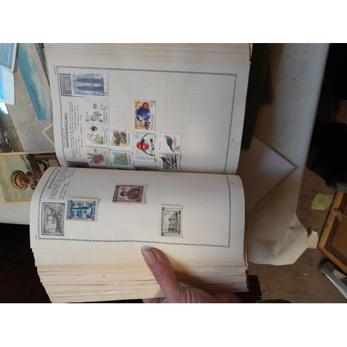 33 - Stamps and postcards : well filled world stamp album dating from 19th - late 20th century with colou... 