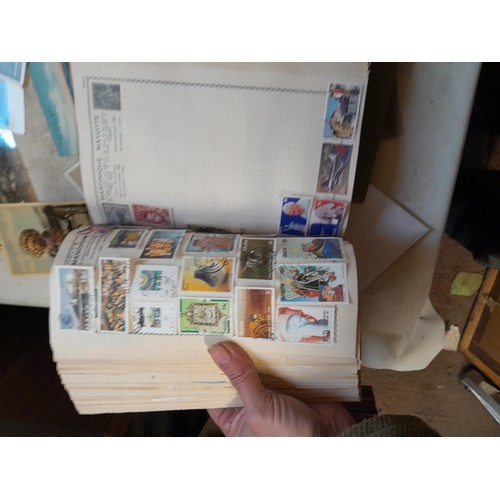 33 - Stamps and postcards : well filled world stamp album dating from 19th - late 20th century with colou... 