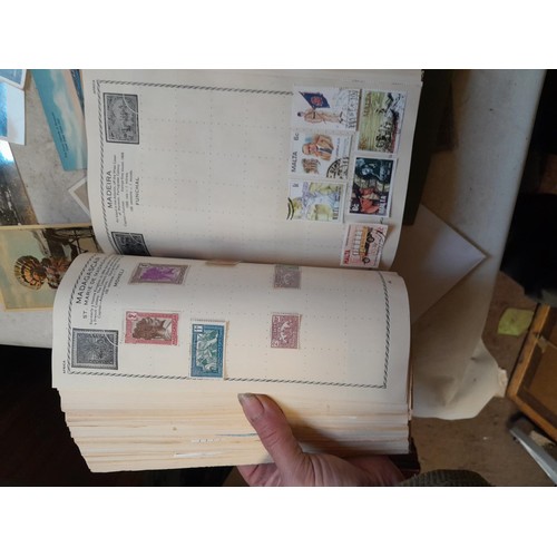 33 - Stamps and postcards : well filled world stamp album dating from 19th - late 20th century with colou... 