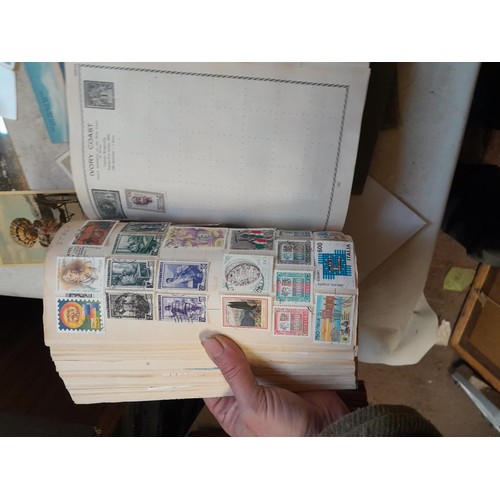 33 - Stamps and postcards : well filled world stamp album dating from 19th - late 20th century with colou... 