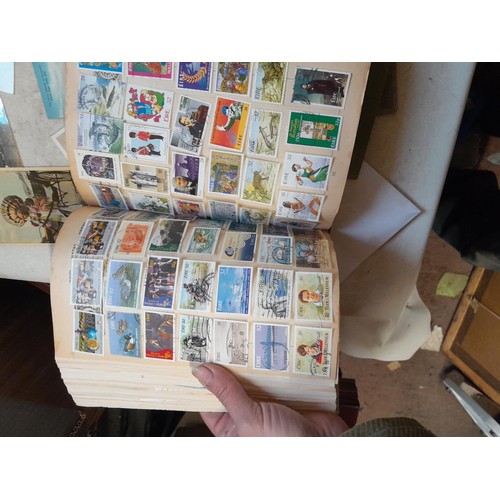 33 - Stamps and postcards : well filled world stamp album dating from 19th - late 20th century with colou... 