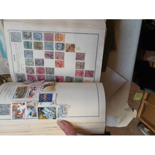 33 - Stamps and postcards : well filled world stamp album dating from 19th - late 20th century with colou... 