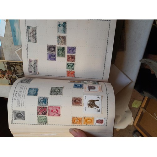 33 - Stamps and postcards : well filled world stamp album dating from 19th - late 20th century with colou... 