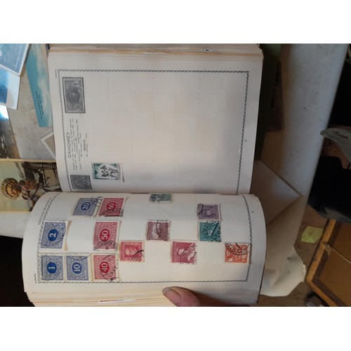 33 - Stamps and postcards : well filled world stamp album dating from 19th - late 20th century with colou... 