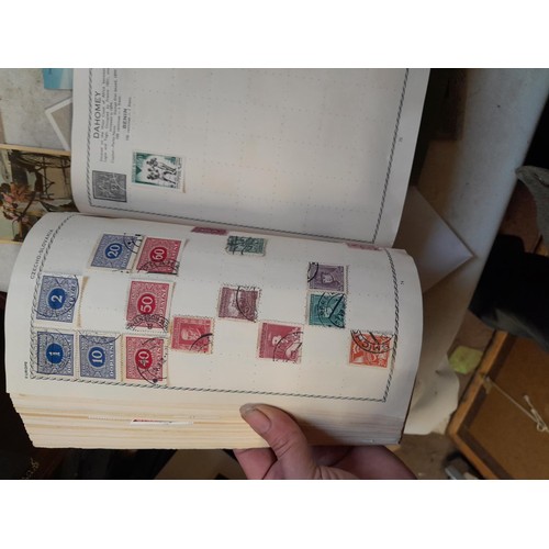 33 - Stamps and postcards : well filled world stamp album dating from 19th - late 20th century with colou... 