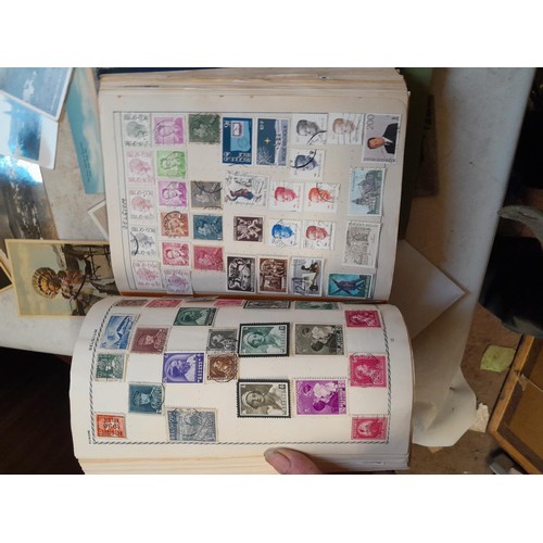 33 - Stamps and postcards : well filled world stamp album dating from 19th - late 20th century with colou... 