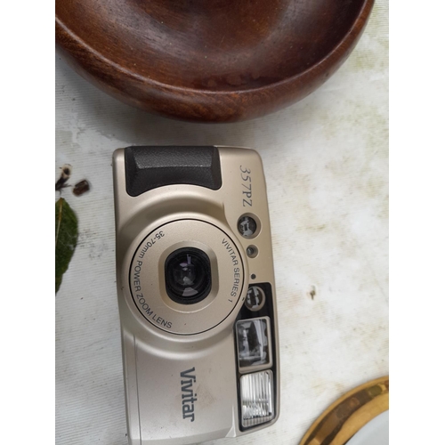 36 - Box of oddments : cameras, Vivitar lens, damaged coloured glass, untested valve,  table ships wheel ... 