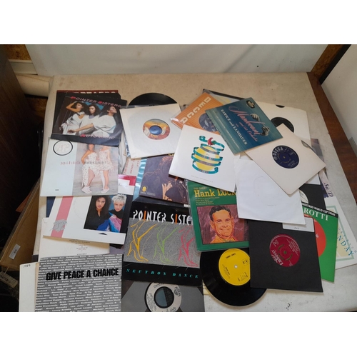 84 - Varied selection of vinyl record singles : commercial pop from 1960s - 1980s, picture discs, coloure... 