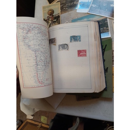 33 - Stamps and postcards : well filled world stamp album dating from 19th - late 20th century with colou... 