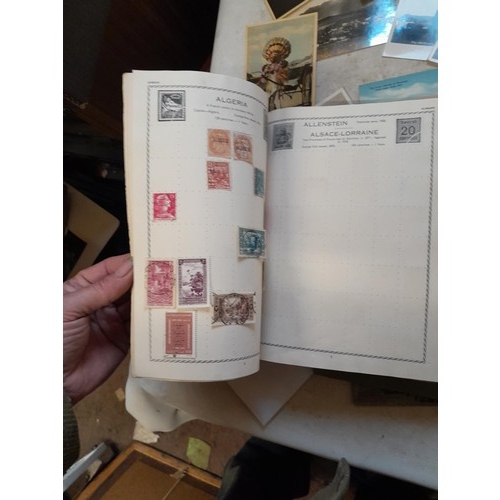 33 - Stamps and postcards : well filled world stamp album dating from 19th - late 20th century with colou... 